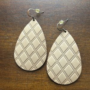 Nickel and suede earring